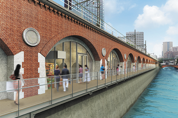 赤レンガの高架下を有効活用する神田川沿いの店舗を親水デッキ